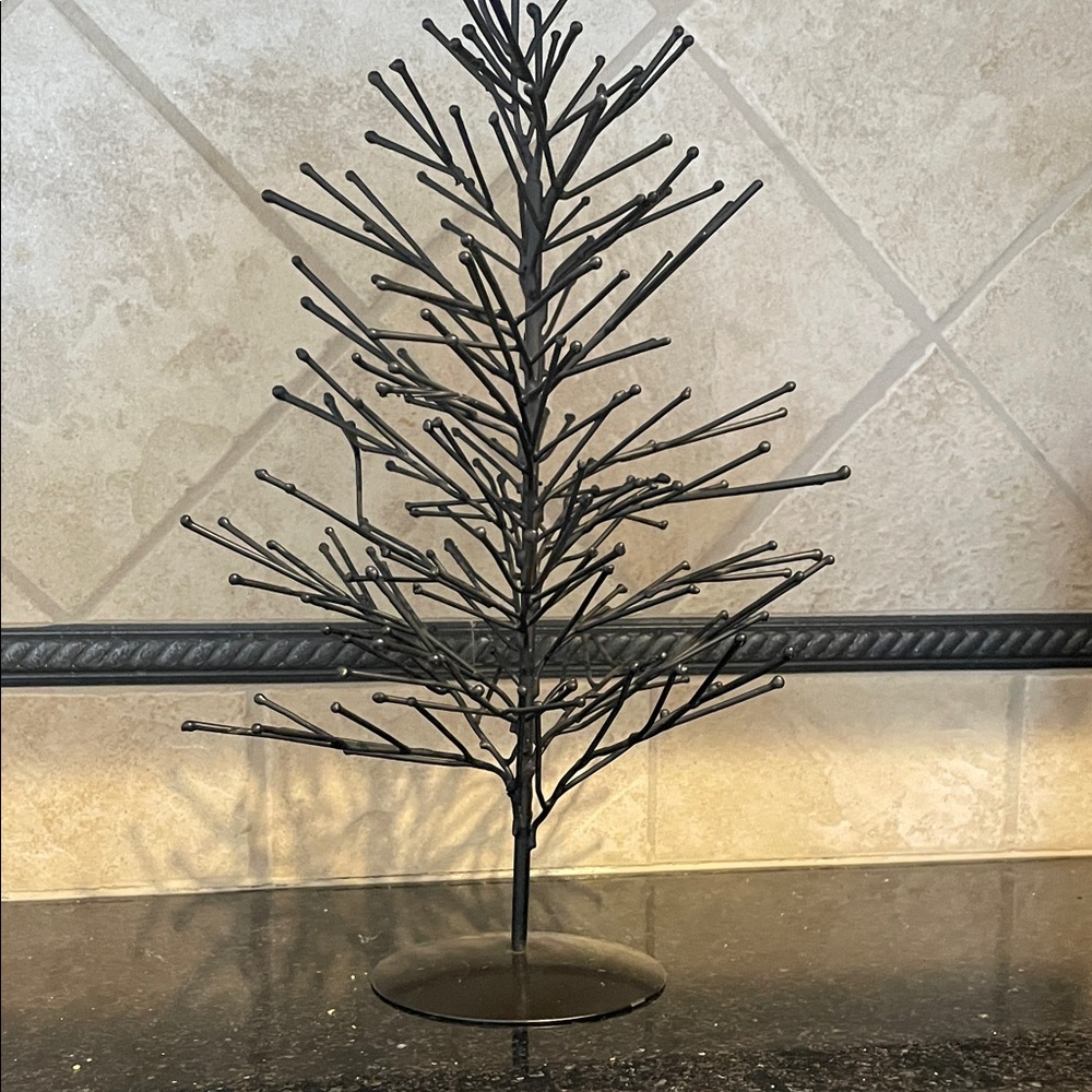 Black Abstract Metal Tree Decor brings the outdoors in.